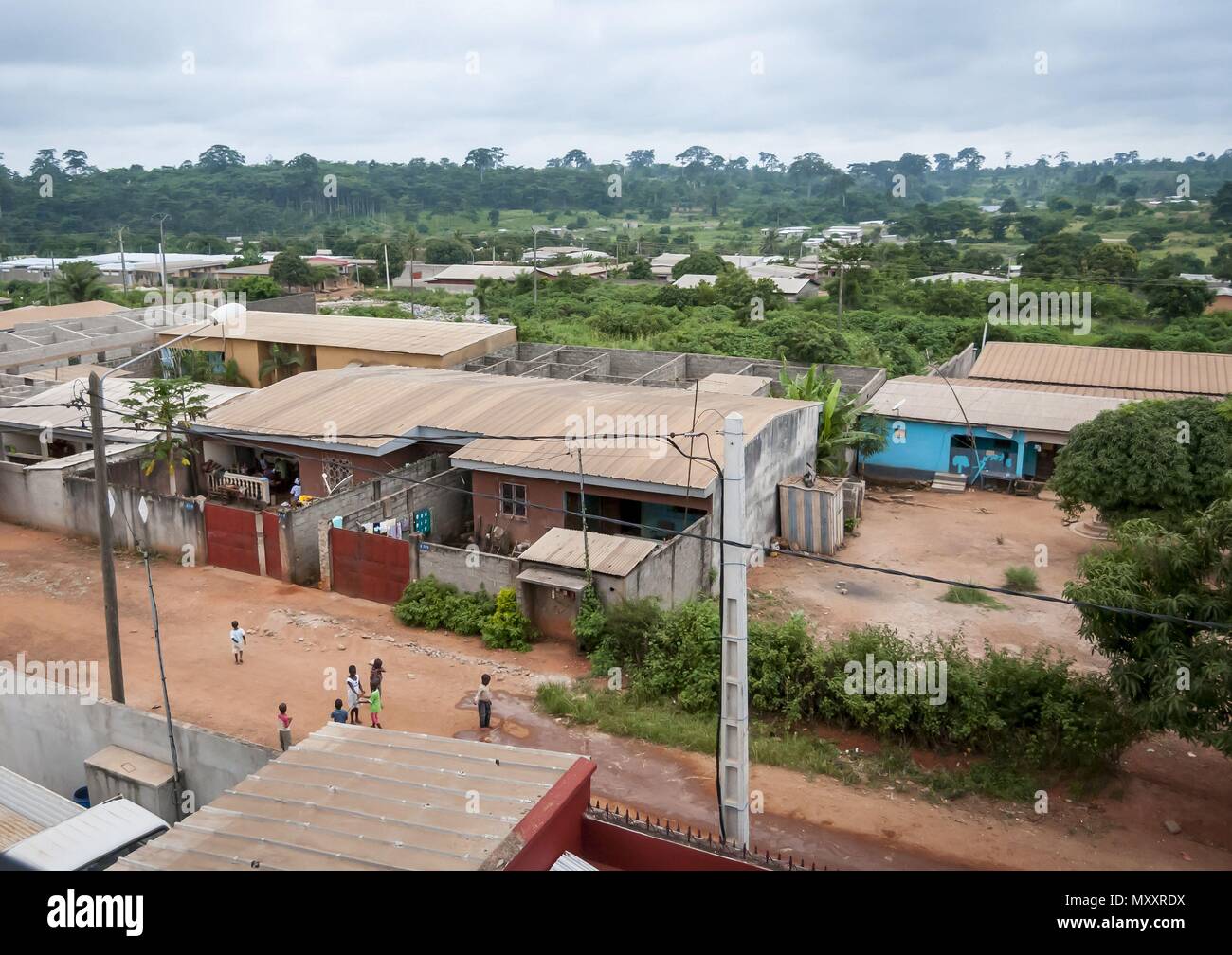A general view of an African town of Daloa, Ivory Coast. July 2013. African shacks stock image. Stock Photo