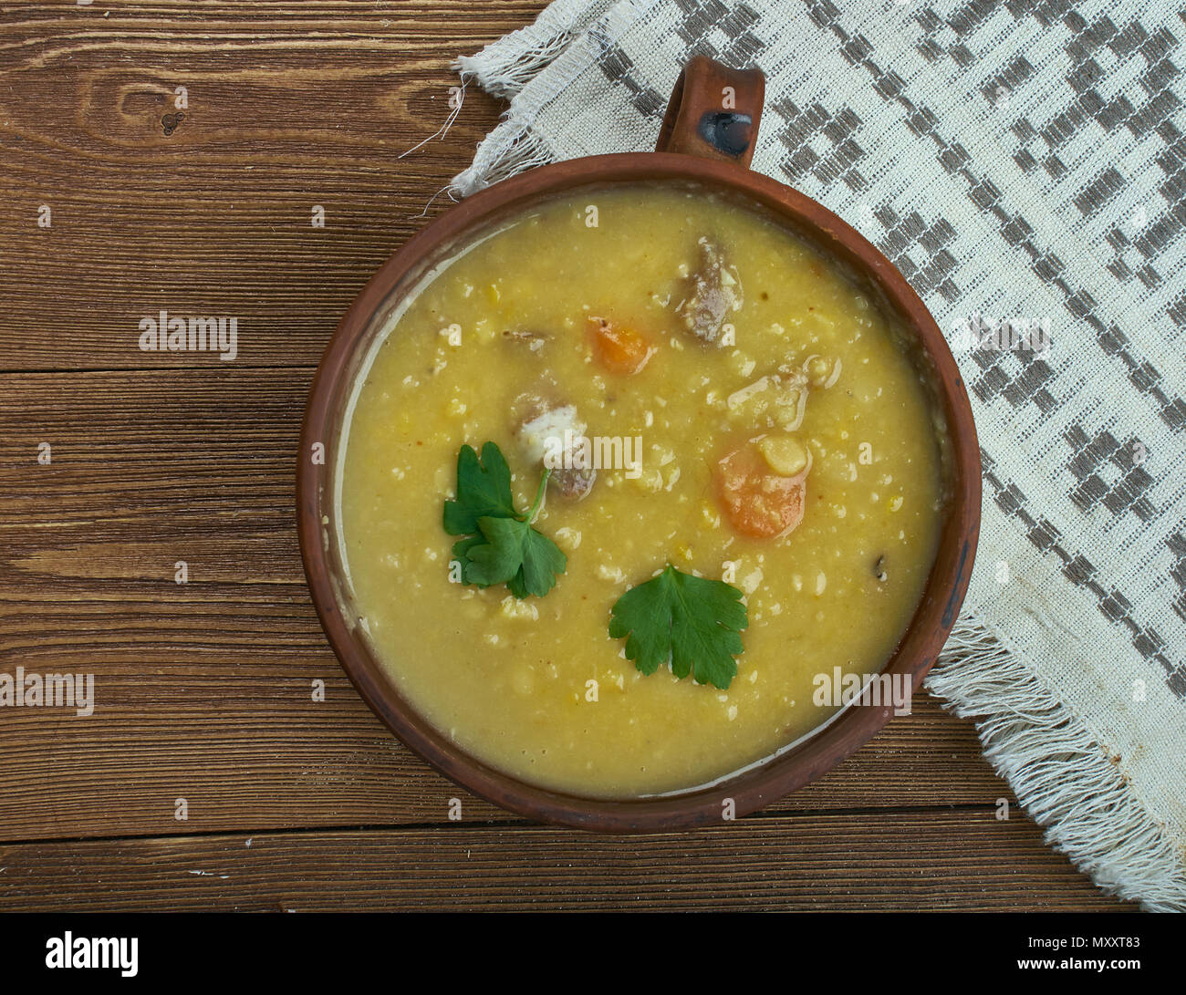 German Split Pea Soup, ham hock, beef broth, split peas, and carrots