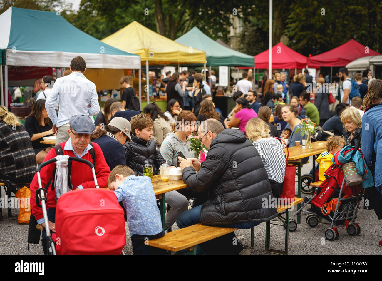 London, UK - October 2017. People shopping at Brockley Market, a local farmer's market held every Saturday in Lewisham. Landscape format. Stock Photo
