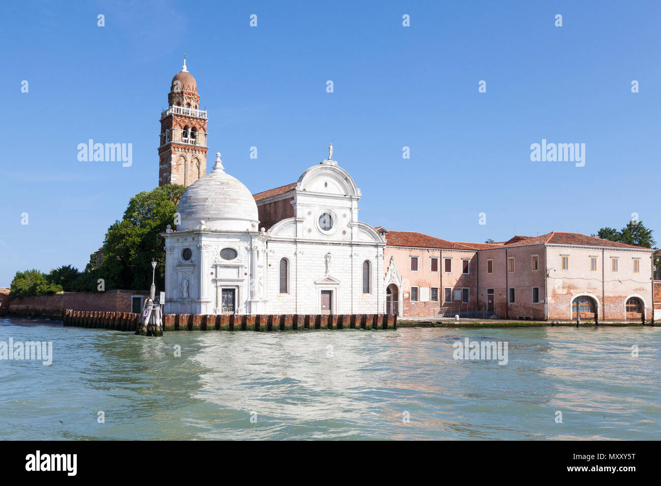 The Renaissance facade and bell tower of Chiesa di San Michele in Isola, San Michele Island, Venice, Veneto, Italy. Built 1469. Cemetery island. Monas Stock Photo