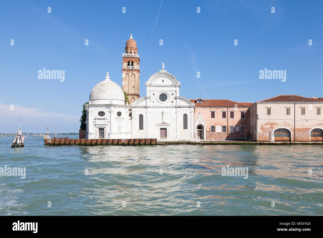 The Renaissance facade and bell tower of Chiesa di San Michele in Isola, San Michele Island, Venice, Veneto, Italy. Built 1469. Cemetery island. Monas Stock Photo