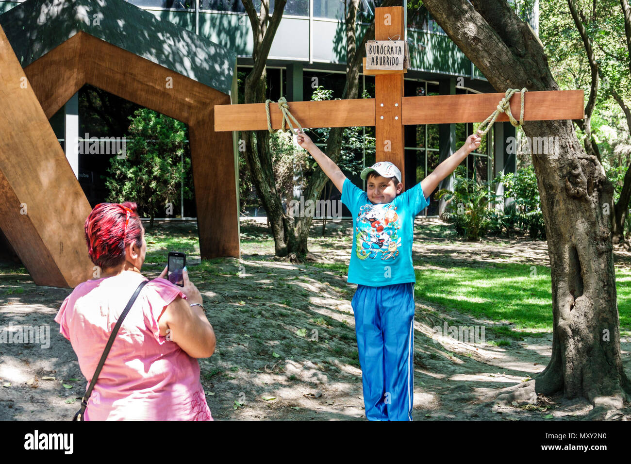 Mexico City,Polanco,Hispanic Mexican,Bosque de Chapultepec forest park parque,Museo de Arte Moderno MAM Museum Modern Art,sculpture garden,cross,woman Stock Photo