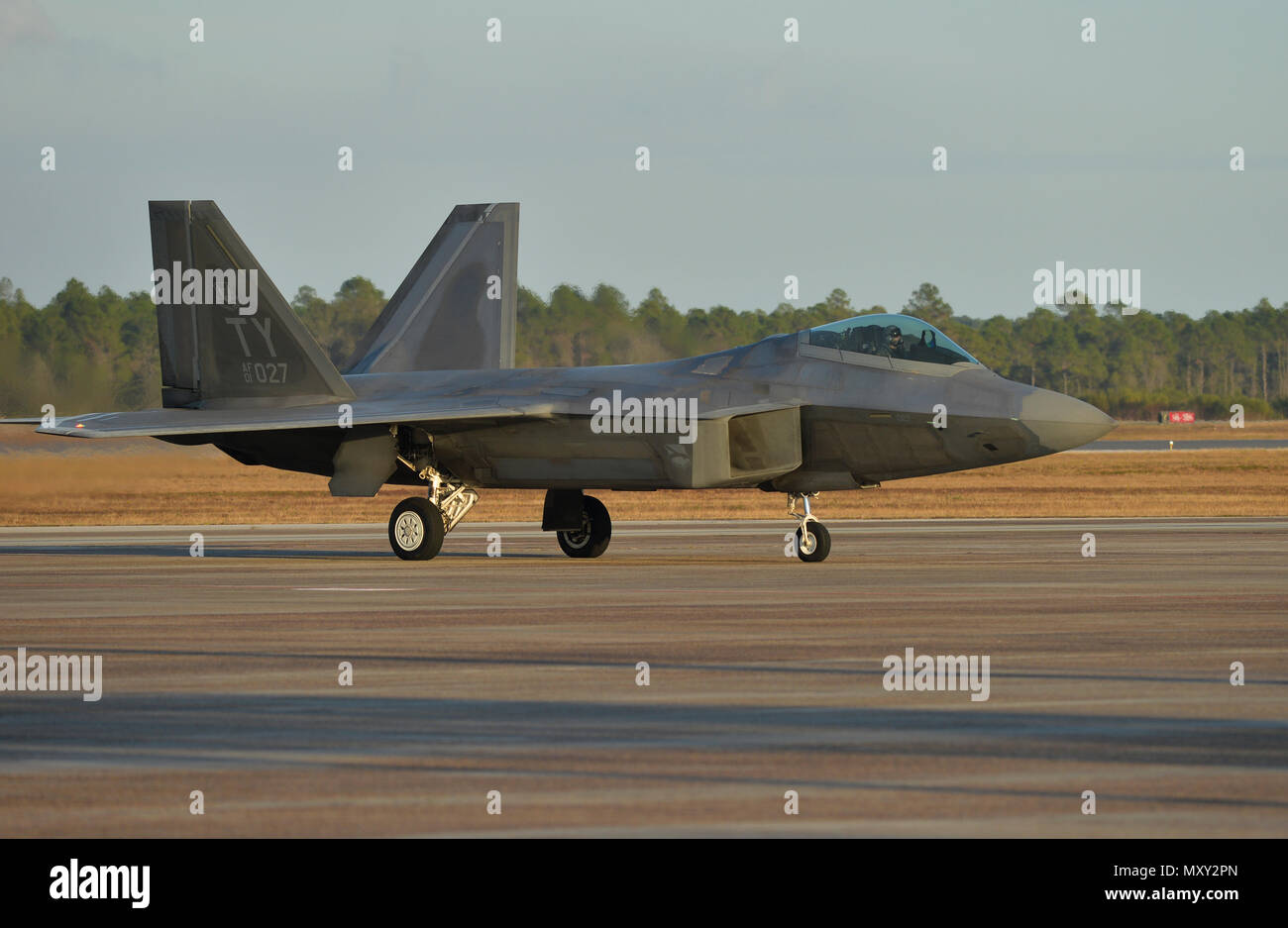 A U.S. Air Force F-22 Raptor from Tyndall Air Force Base taxies down ...