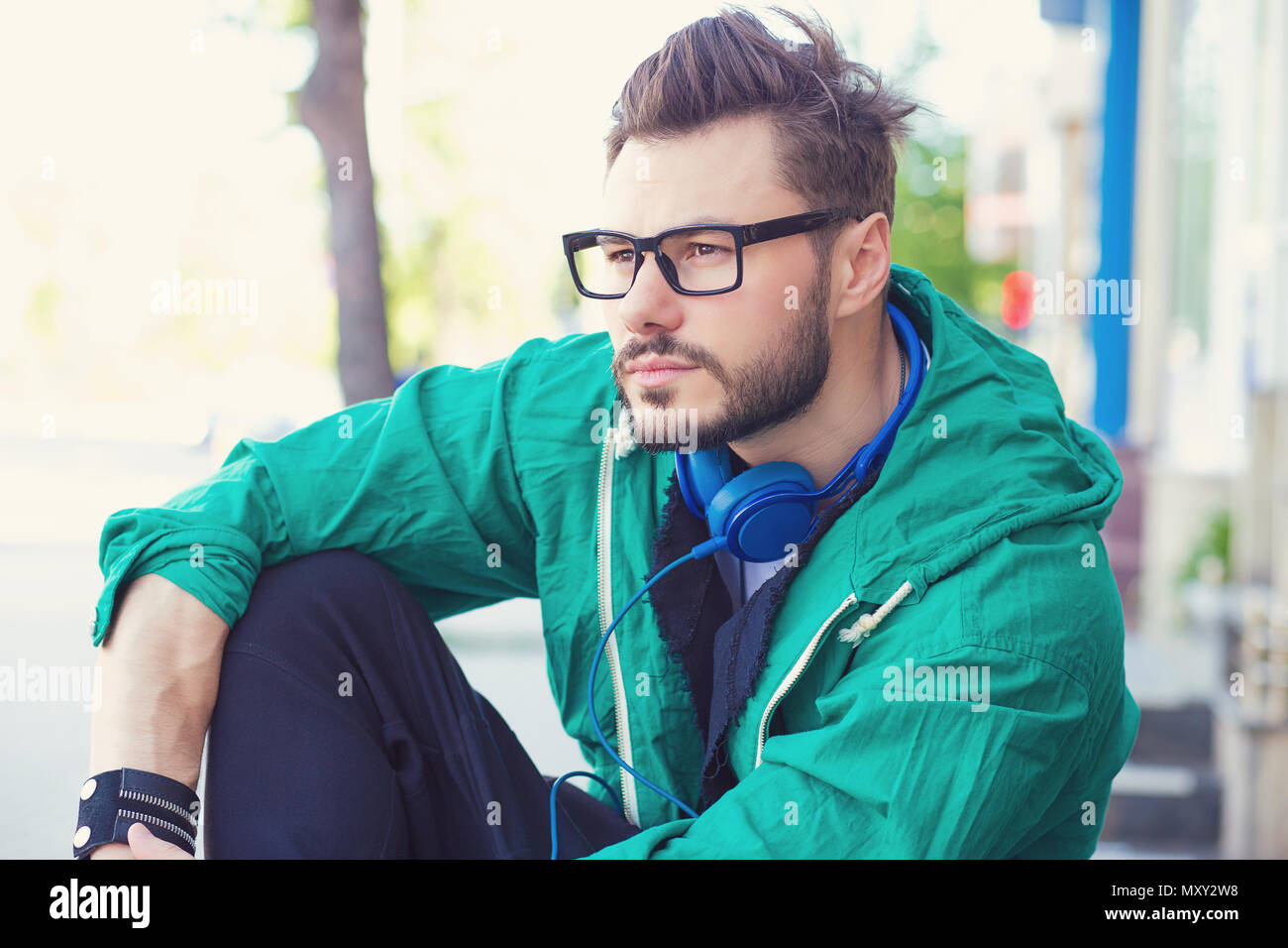 Handsome guy in thinking pose hi-res stock photography and images - Alamy