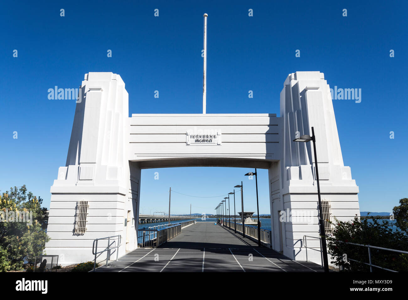 Horizontal view of the Art Deco concrete abutment portal arch which frame the north end of the Hornibrook Bridge, in Clontarf, Redcliffe Peninsula, Au Stock Photo
