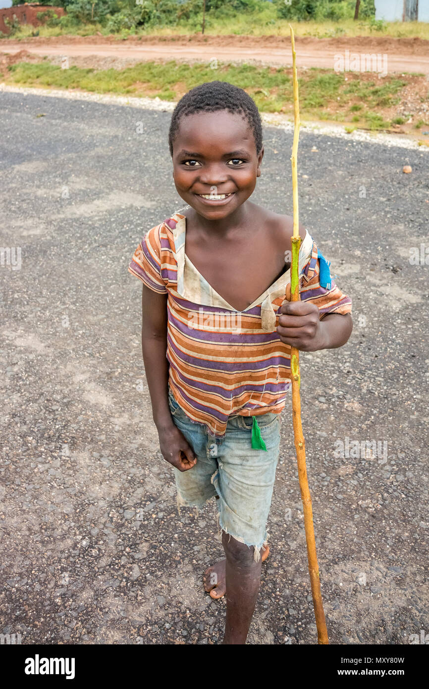 Nyimba, Zambia - April 1, 2015: Young boy on the road in Nyimba small village in Zambia Stock Photo