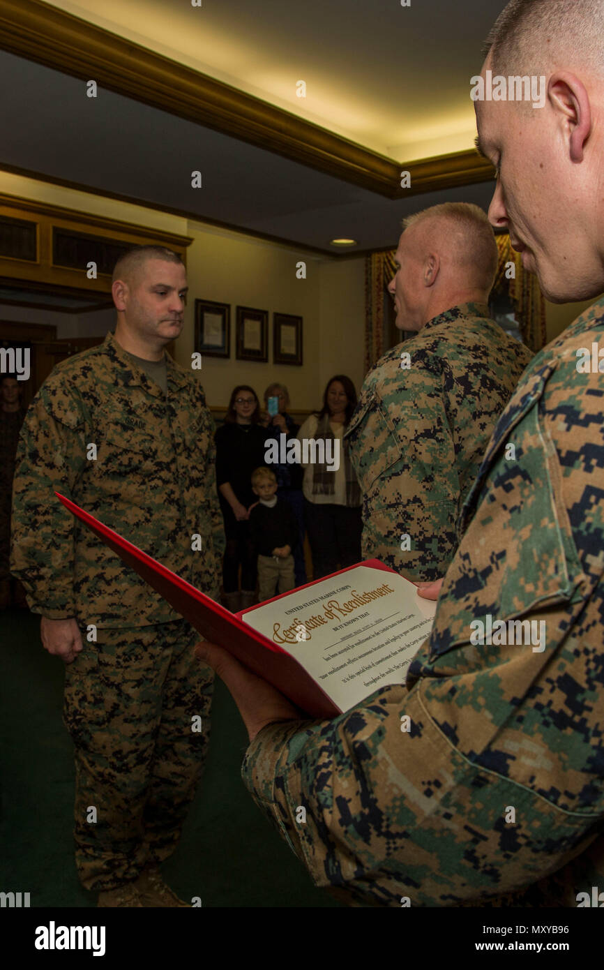 U.S. Marine Corps Staff Sgt. Theodore Johnston, right, career planner