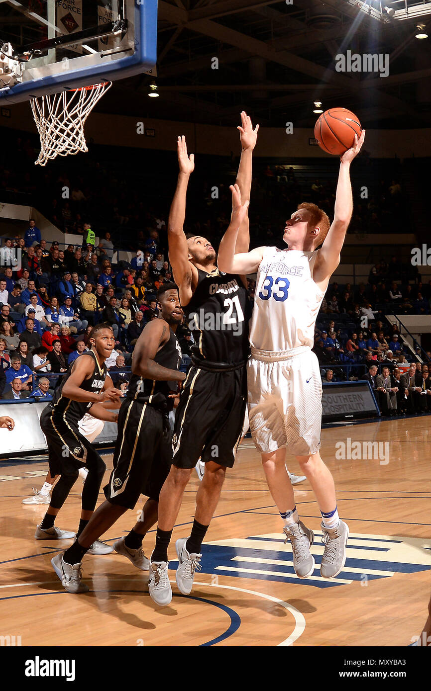 Frank Toohey, a junior, drives to the basket as Air Force met the Colorado  Buffaloes in a non-conference matchup at the U.S. Air Force Academy's Clune  Arena in Colorado Springs, Colorado, Dec.