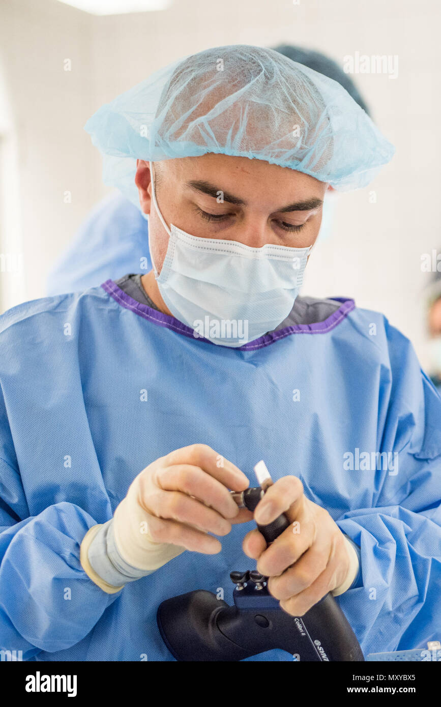 Photo of surgical instrument technician hires stock photography and