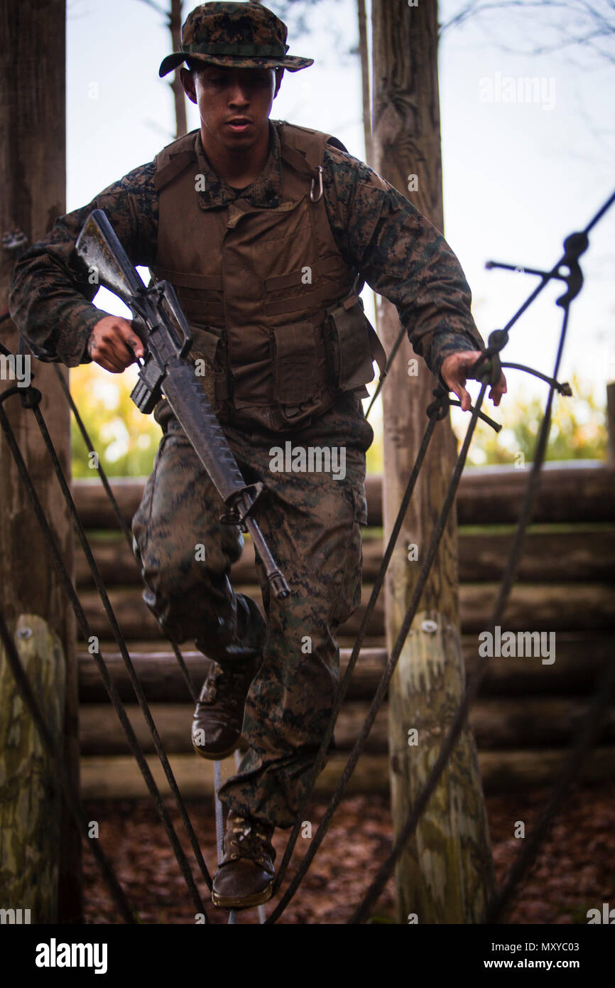 Marine Corps Combat Camera Marines cross rope bridges and navigate ...