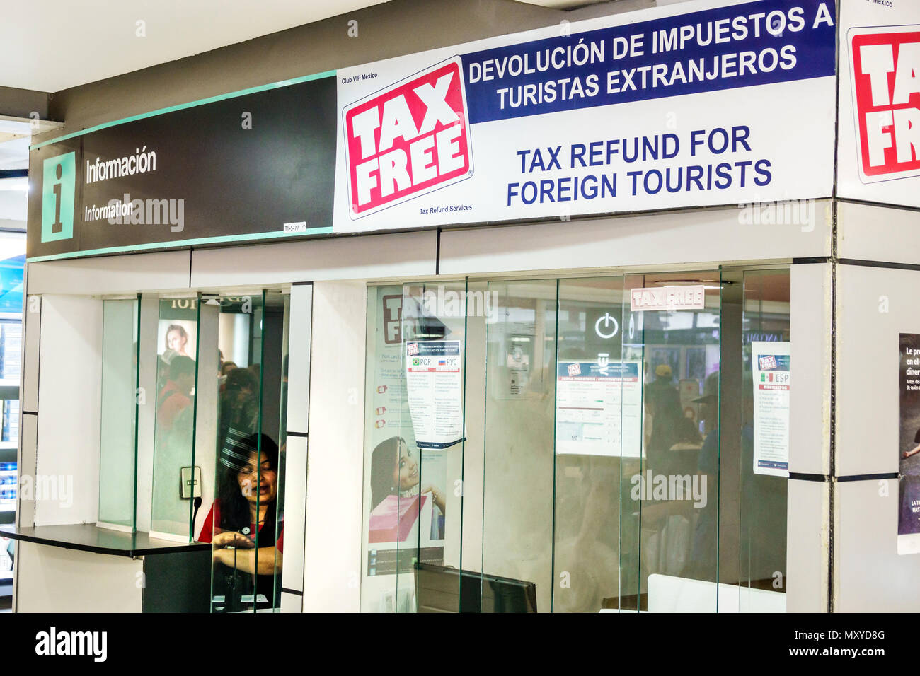 Mexico City,Mexican,Hispanic,Benito Juárez International Airport MEX,foreigner tax refund kiosk,bilingual sign,terminal gate,Spanish English MX1803120 Stock Photo
