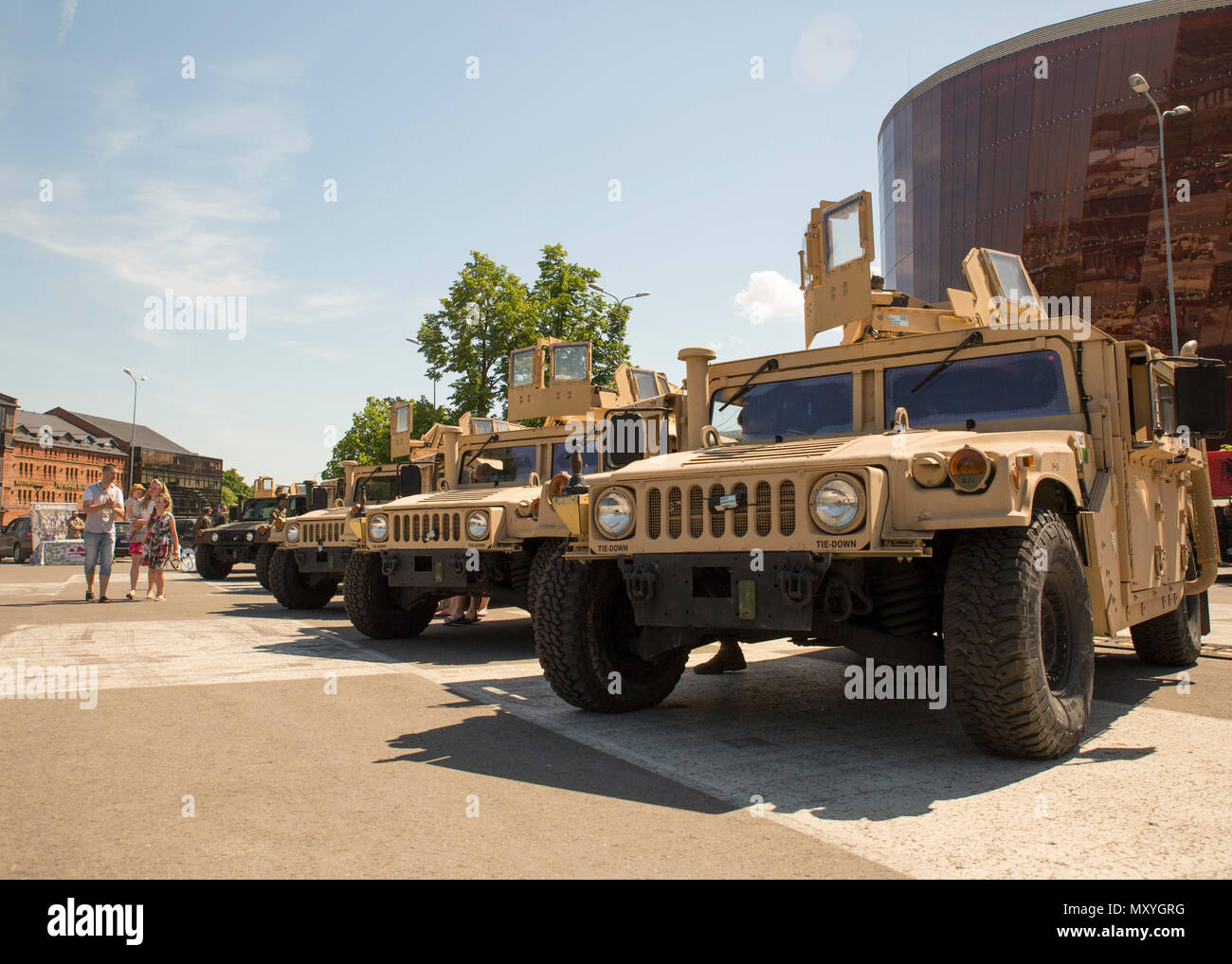 U.S. Marines park their HMMWVs for presentation before a static-display event demonstrating military vehicles and gear in Liepaja, Latvia, May 30, 2018. The multinational civil engagement gave the citizens of Liepaja the opportunity to interact with the different militaries involved in Exercise Saber Strike 18. Saber Strike is a U.S. joint and multinational exercise conducted at various locations throughout the Baltic States and Poland. The annual exercise prepares Allies to respond to regional crises and enhance the NATO alliance throughout the region.(U.S. Marine Corps photo by Sgt. Adwin Es Stock Photo