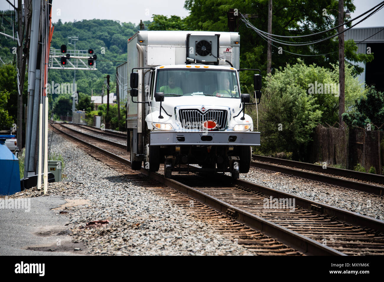 Railroad worker truck adapted with railroad wheels to allow it to