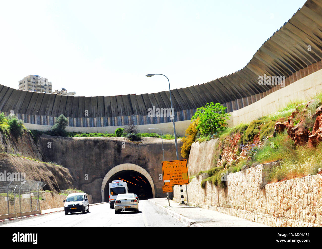 The ' Tunnel road' built by Israel with wall protection in Gush Etzion, West Bank Stock Photo