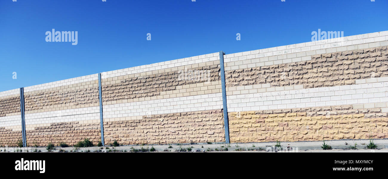 Israeli highway with wall protection in Gush Etzion, West Bank. Stock Photo