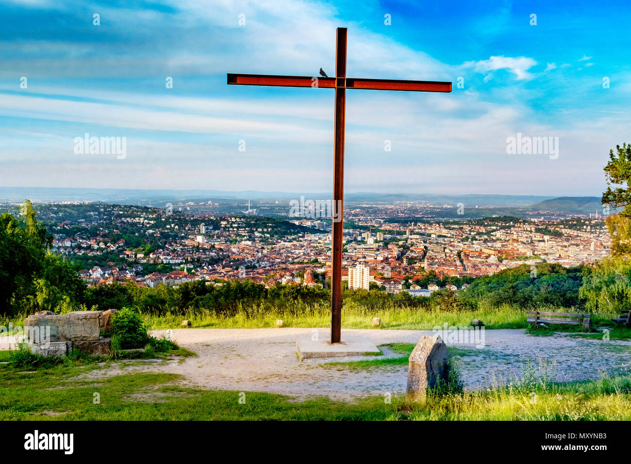 Rubble hill Birkenkopf in Stuttgart, Germany, with its huge rusty cross on the top Stock Photo