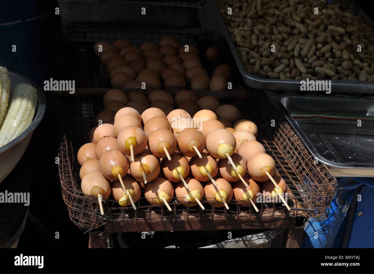 Grilled eggs on a stick, Thailand Stock Photo Alamy