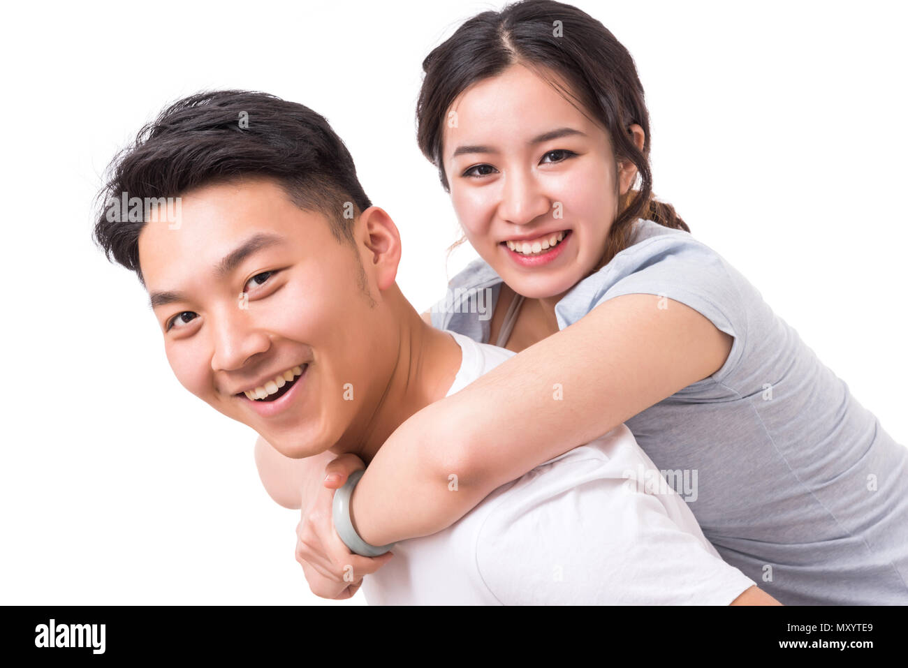 Portrait of young happy smiling couple. Stock Photo