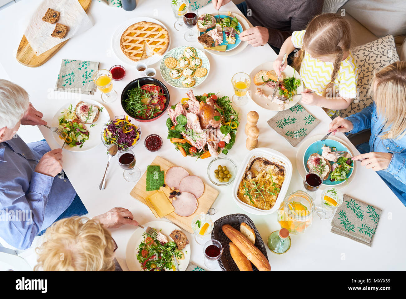 Happy Woman Eating Big Meal High Resolution Stock Photography and