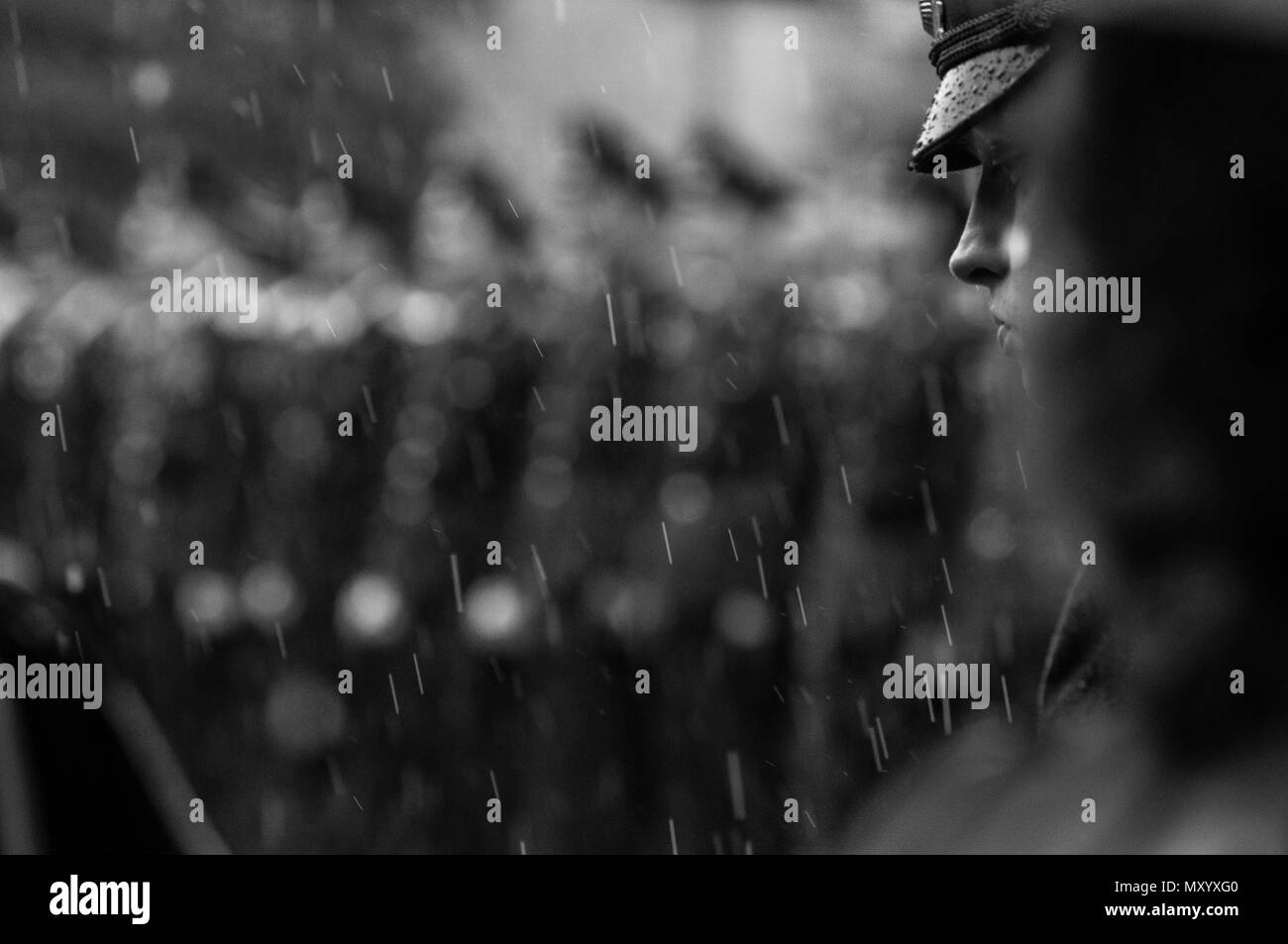 OBNINSK, RUSSIA - MAY 9, 2012: The policeman becomes wet under the rain on Victory Day Stock Photo