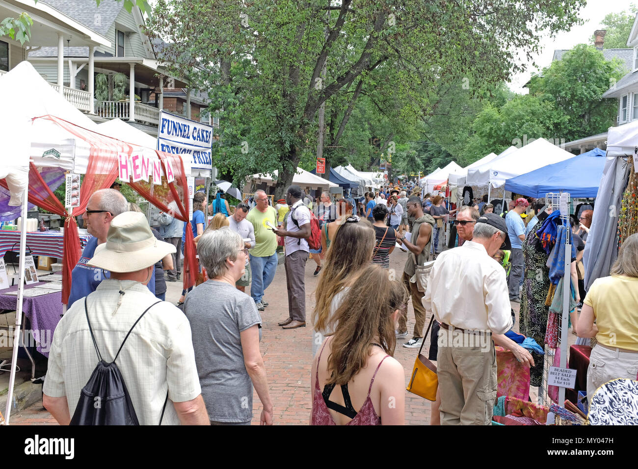 Hessler Street visitors take to the street at the 49th Annual Hessler Street Fair, a fair promoting community awareness, togetherness, and harmony. Stock Photo
