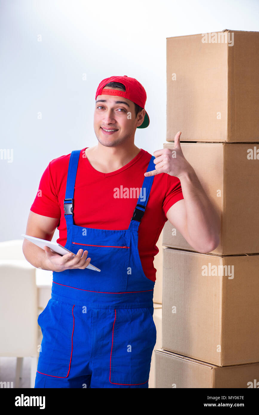 Contractor worker moving boxes during office move Stock Photo