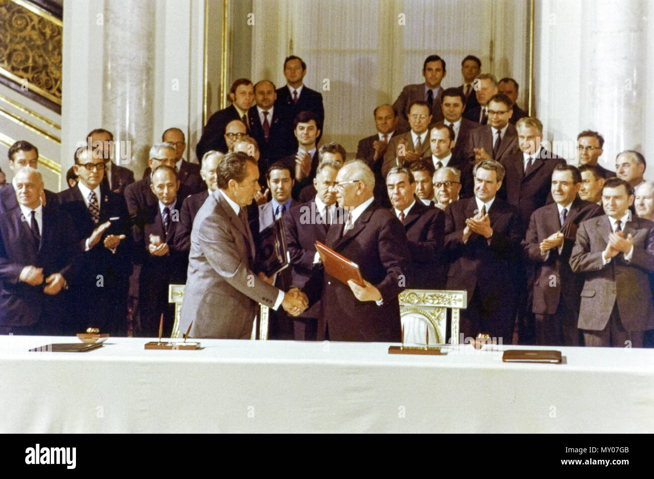 President Nixon and Nikolay Podgorny (Chairman of the Presidium of the Supreme Soviet of the USSR) sign agreements in cooperation between the United States and USSR in the fields of environmental protection, medical science, and public health at St. Vladimir Hall in the Grand Kremlin Palace, Moscow. Stock Photo