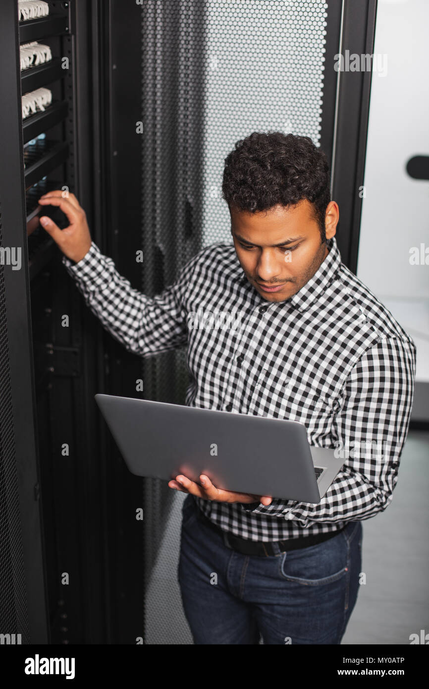 Professional IT guy controlling system Stock Photo - Alamy