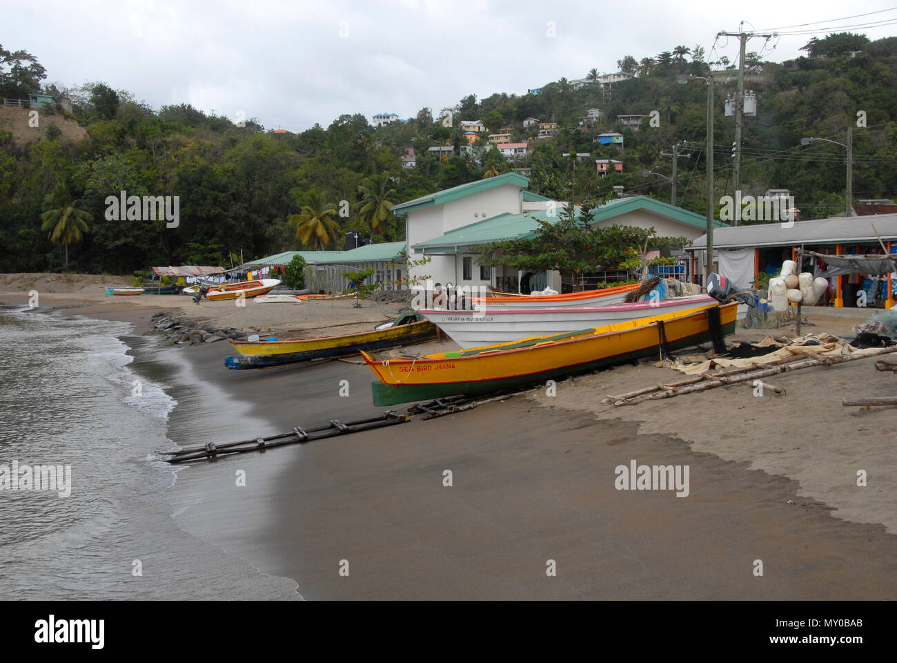 Several small fishing boats on beach, St Lucia, Caribbean Stock Photo