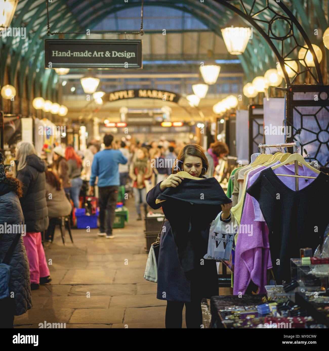 London, UK - October 2017. People shopping at the Apple market in Covent Garden. Square format. Stock Photo