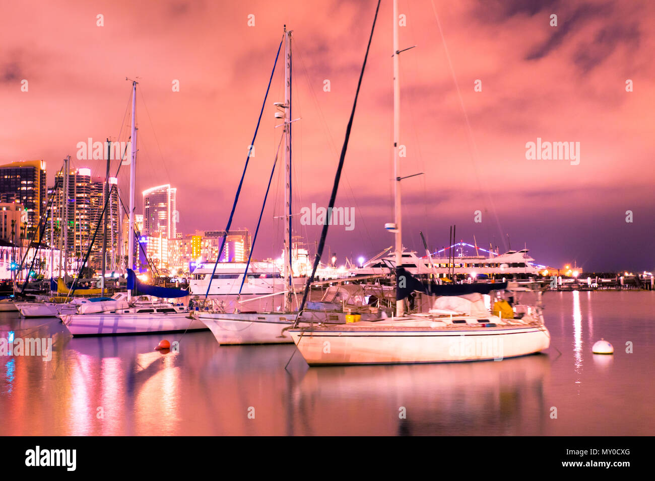 Beautiful San Diego California sunset with skyline, boats and water Stock Photo