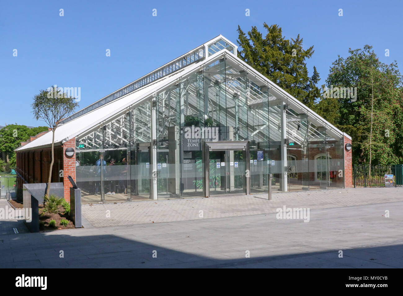 Renovated Victorian Building, the glass facade of the newly refurbished Tropical Ravine in Botanic Gardens Belfast Northern Ireland. Stock Photo