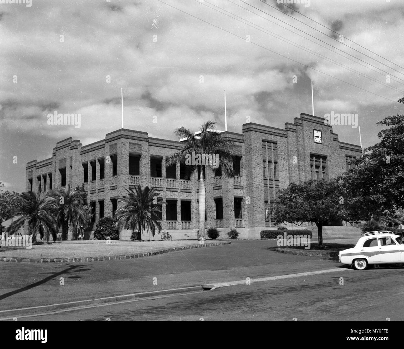 Town Hall, Rockhampton, c 1962. From the Queensland Heritage Registerid=601572 ) .  Rockhampton emerged as an important Queensland regional centre during the 1850s and 1860s. This development took on especial prominence after the discovery of the mining wealth at Mount Morgan in 1882. The additional affluence that flowed on for Rockhampton fuelled a rapid expansion of public and private buildings and residences throughout the City and surrounds. This building boom allowed for many grand places to be constructed, especially renowned along the commercial and government sector near the wharves on Stock Photo