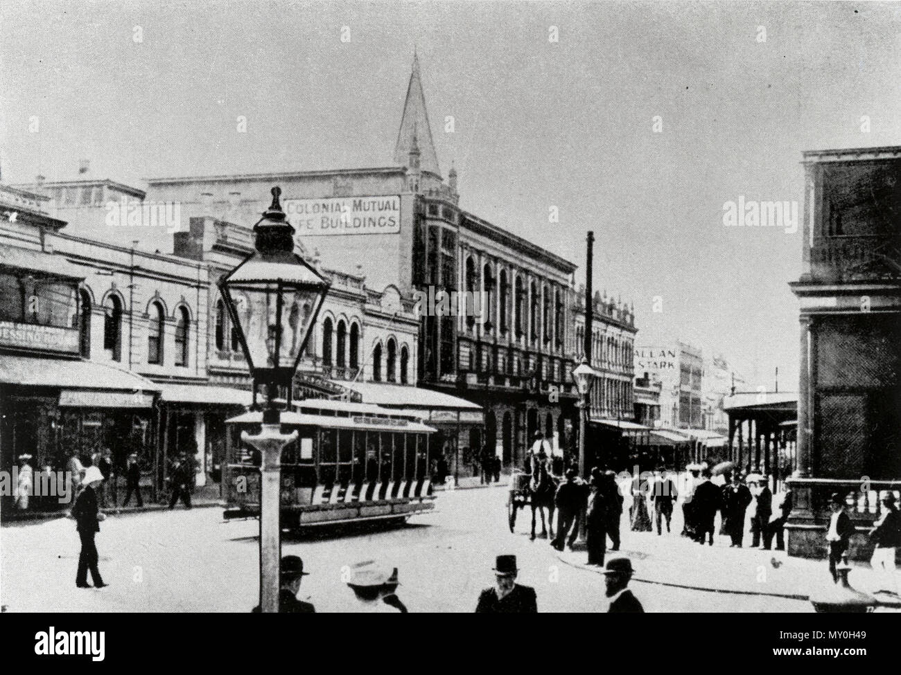 Corner of Queen and George Streets, Brisbane c1910. The Brisbane Courier 2 May 1910  Runaway In Queen-street. 19632745 )   Some excitement was caused in Queen-street on Saturday by a horse attached to a cart, winch had been standing out side an undertaker's establishment oppo- site the Town hall, bolting up the street at full gallop, in the direction of the bridge. There was a good deal of traffic in the street at the time, but the horse reached the corner of George-street without coming into collision with any of the vehicles that were passing up and down. Constable Zohn pluckily endeavoured  Stock Photo