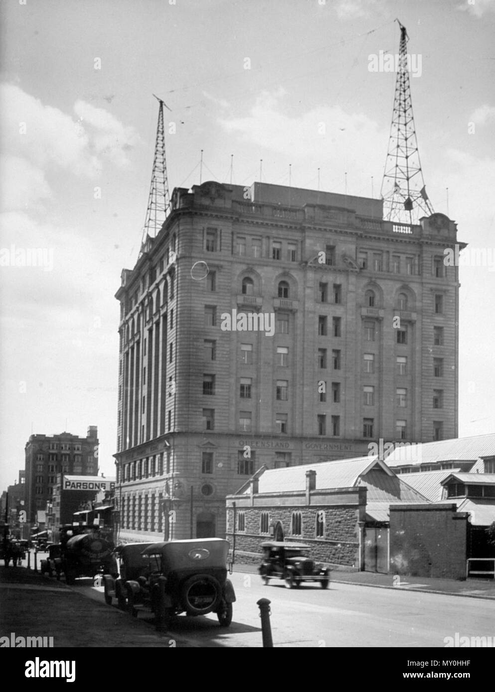 Family Services Building, George Street, Brisbane, September 1926. From the Queensland Heritage Registerid=600111 ) .  Brisbane's first high-rise government office building was constructed between 1914 and 1922. It was intended partly as general public offices, but more importantly as state headquarters for the enormously successful Queensland Government Savings Bank, established in 1864.  Bank headquarters had occupied a purpose-designed banking chamber and offices in the second wing of the Treasury Building from early 1893. By 1912 these premises were no longer adequate. In consequence, the  Stock Photo