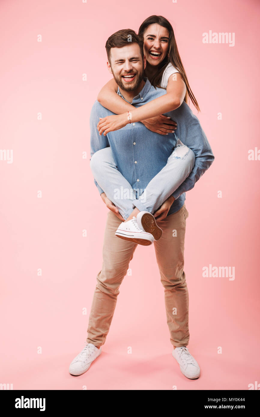 Midadult Caucasian Woman Giving Man Piggyback Stock Photo 3194063