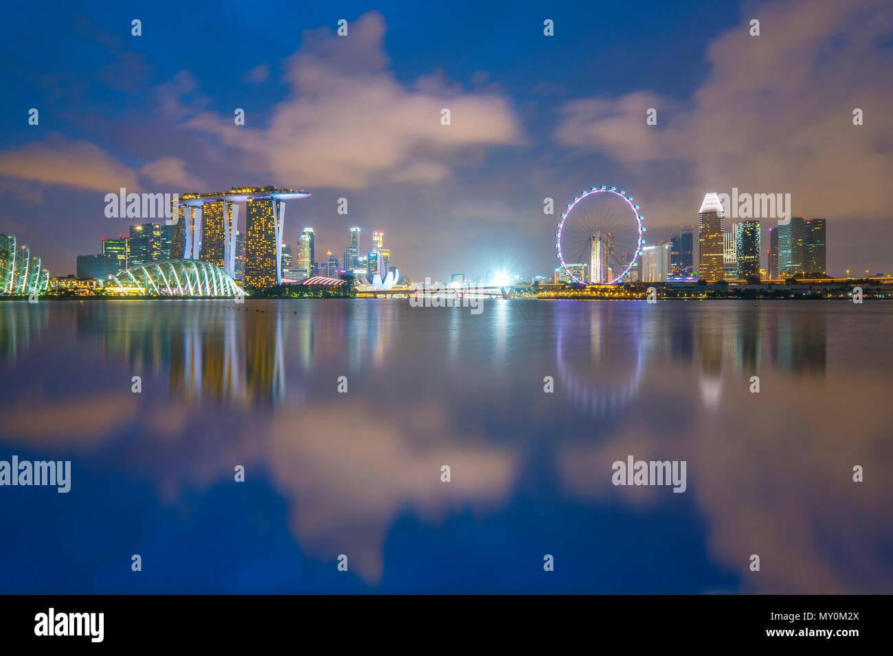 Singapore cityscape skyline with Marina Bay at night. Stock Photo