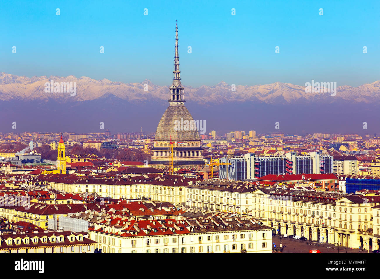 Turin In Italy Cityscape of Turin with spire of Mole Antonelliana against backdrop of ...