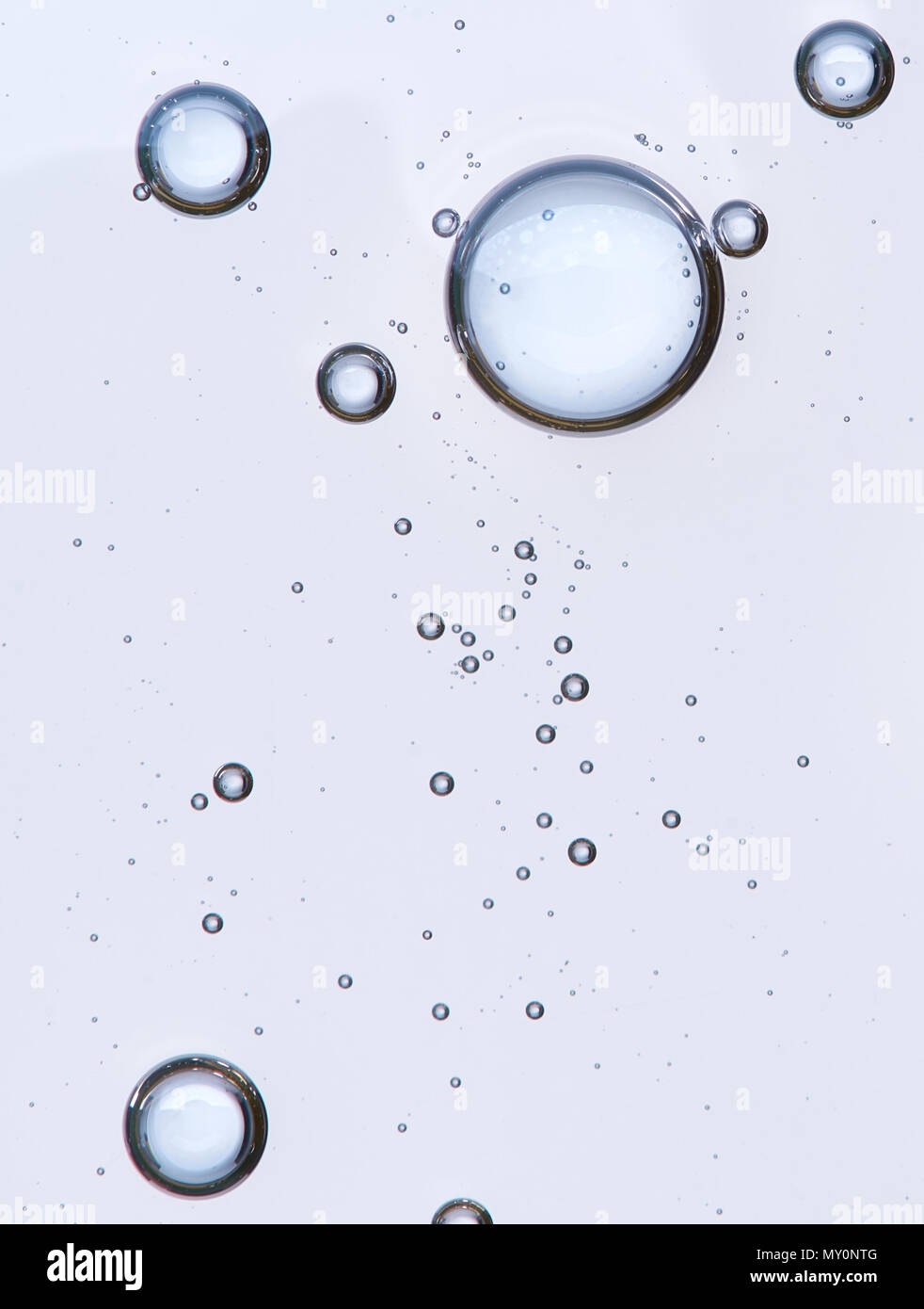 Full frame of the textures formed by the bubbles and drops of oil in ...