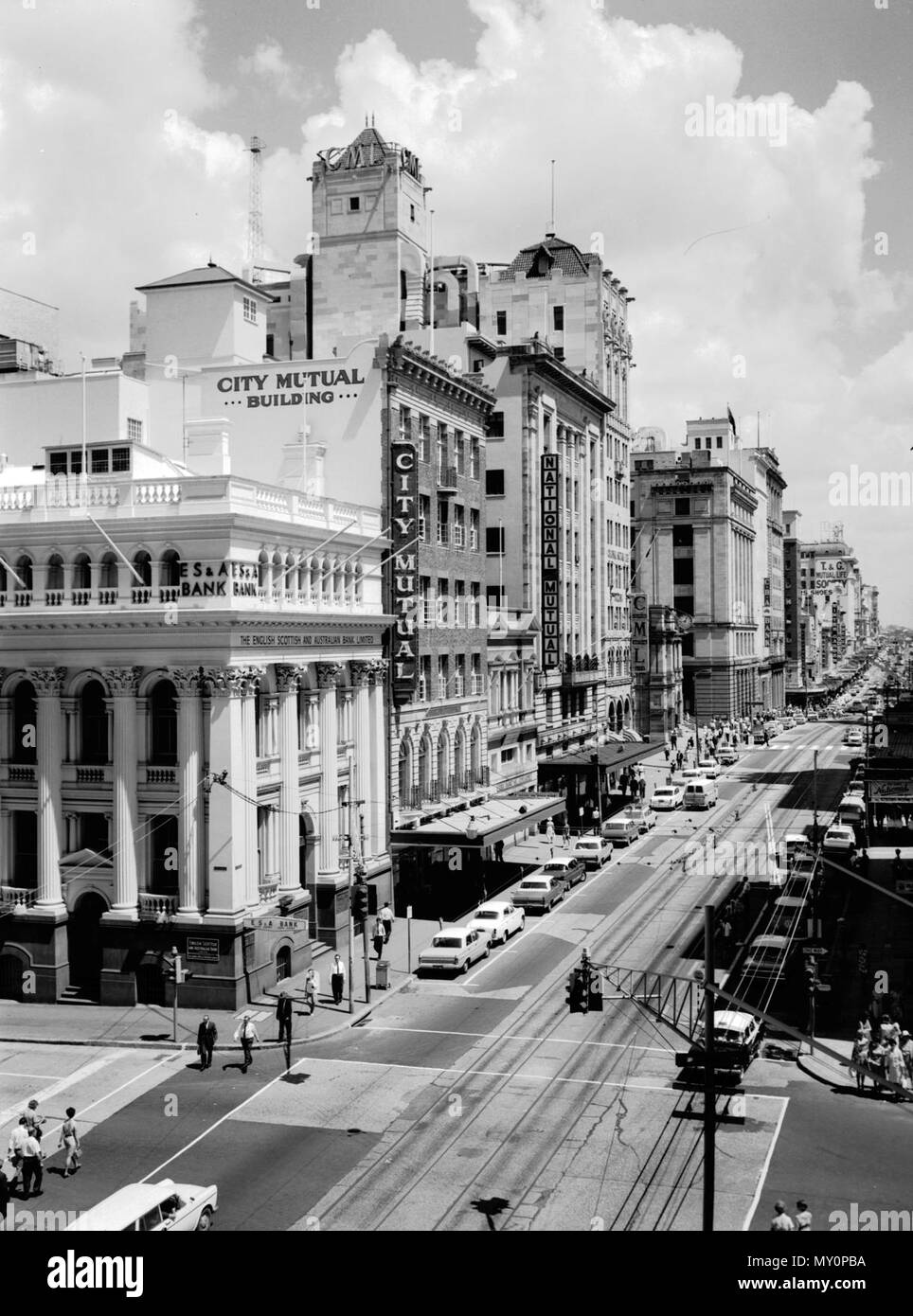 Queen Street, Brisbane, 1965. Queen Street was the hub of Brisbane's financial district, housing the headquarters of many banks and insurance companies. Visible in this photograph are the now heritage listed National Mutual Life Building, Newspaper House and MacArthur Chambers. Stock Photo