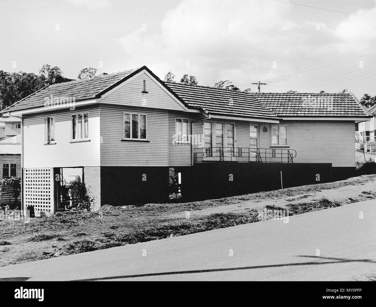 Queensland Housing Commission dwelling, Tarragindi, Brisbane, c 1954. The Telegraph 11 July 1946  State Has 1,333 Building Blocks 188730456 )   Up to June 30 last the Queensland Housing Commission had acquired land totalling 1,333 building allotments in Brisbane, the Minister for Works and Housing (Mr Bruce) announced today.  The lands were located as follows: Ashgrove, 99 allotments; Banyo, 11; Camp Hill, 17; Cannon Hill, 11; Chermside-Wavell Heights, 261; Coorparoo, 187; Corinda-Graceville, 20; Enoggera-Gaythorne-Mitchelton, 228; Fairfield-Yeronga, 25, Indooroopilly-Taringa, 22; Kedron, 20;  Stock Photo