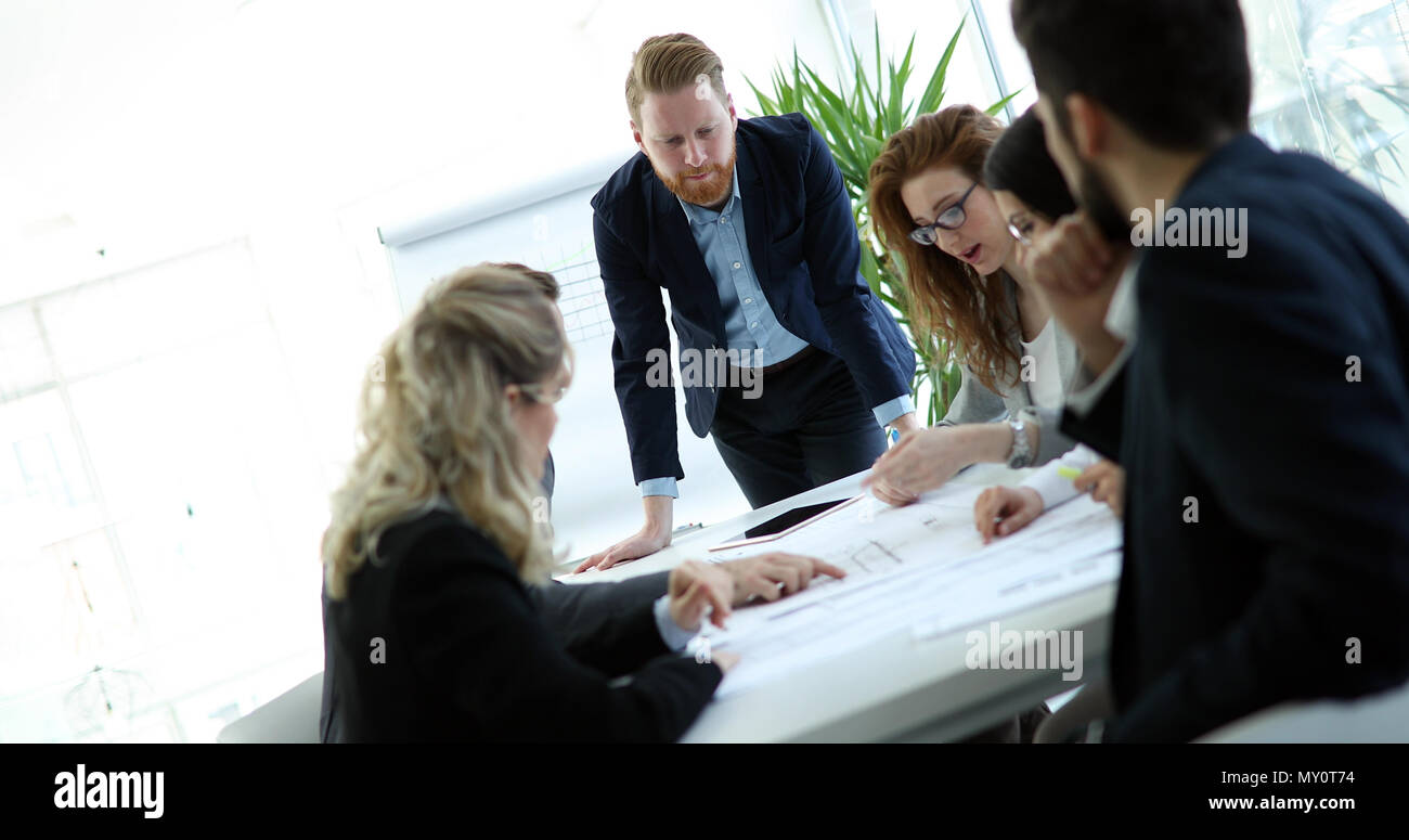 Group of architects working together on project Stock Photo