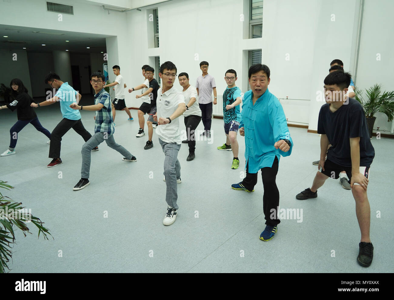 Xi'an, China's Shaanxi Province. 5th June, 2018. Liu Keming, Peking Opera trouper, teaches his students in class at Northwestern Polytechnical University in Xi'an, capital of northwest China's Shaanxi Province, June 5, 2018. The university started running courses of Peking Opera in September last year to promote traditional opera among students. Peking Opera, listed by UNESCO as an intangible cultural heritage, is the most famous among hundreds of forms of local opera in China. Credit: Shao Rui/Xinhua/Alamy Live News Stock Photo