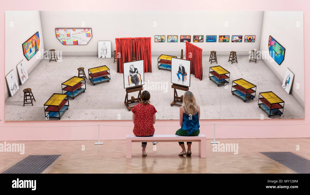 London, UK.  5 June 2018.  Staff members view 'Seven Trollies, Six and a Half Stools, Six Portraits, Eleven Paintings and Two Curtains' by David Hockney RA at the preview of the 250th Summer Exhibition at the Royal Academy of Arts in Piccadilly, which has been co-ordinated by Grayson Perry RA this year.  Running concurrently, is The Great Spectacle, featuring highlights from the past 250 years.  Both shows run 12 June to 19 August 2018. Credit: Stephen Chung / Alamy Live News Stock Photo