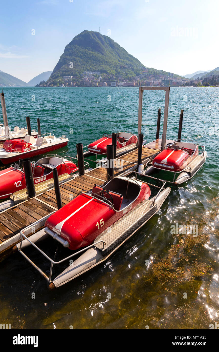 View of Lugano lakefront with the typical pedalos on a spring day, Canton  Ticino, Switzerland Stock Photo - Alamy