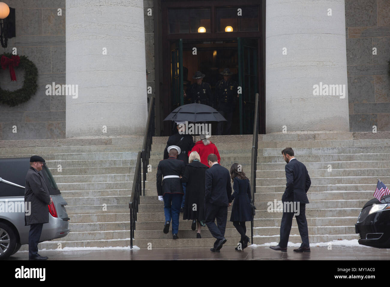 U.S. Marines with Marine Barracks Washington escort family members of Sen.  John H. Glenn, Jr., into the Ohio Statehouse, Columbus, Ohio, before the  Celebration of Life for Glenn on Dec. 17, 2016.