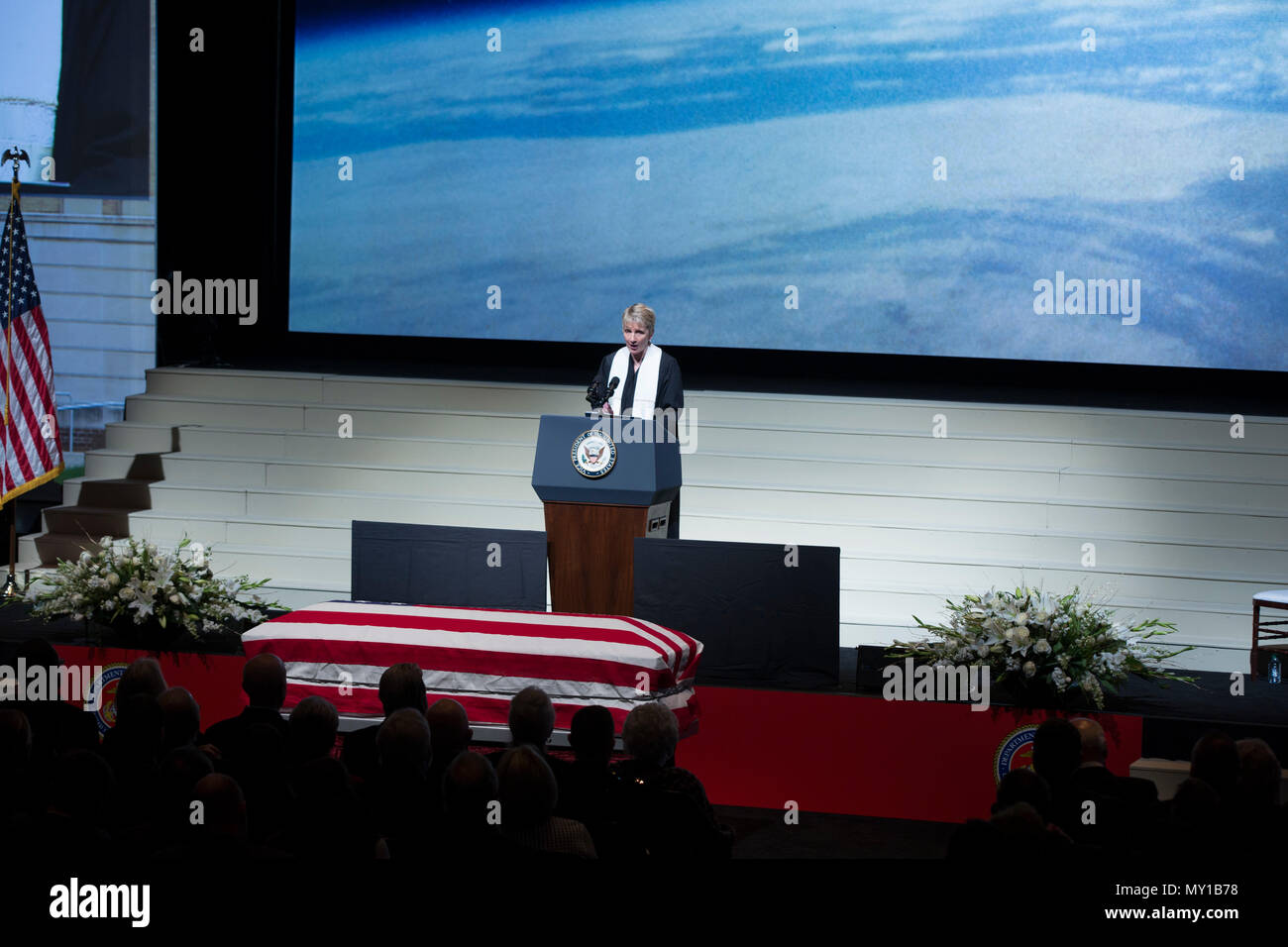 Rev. Amy Miracle, pastor, Broad Street Presbyterian Church, speaks at the Celebration of Life for Sen. John H. Glenn, Jr., at the Ohio State University, Columbus, Ohio, Dec. 17, 2016. Having flown 149 combat missions in World War II and the Korean War, Glenn became the first man to orbit the earth in 1962. After retiring from the space program, Glenn was elected to the U.S. Senate in 1974 to represent the state of Ohio. (U.S. Marine Corps photo by Lance Cpl. Daisha R. Sosa) Stock Photo