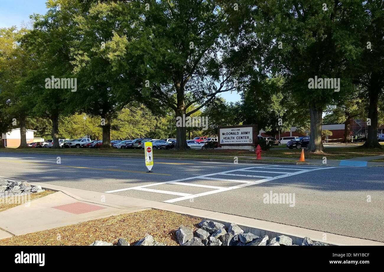 Crossing signs alert drivers to slow down and stop for pedestrians