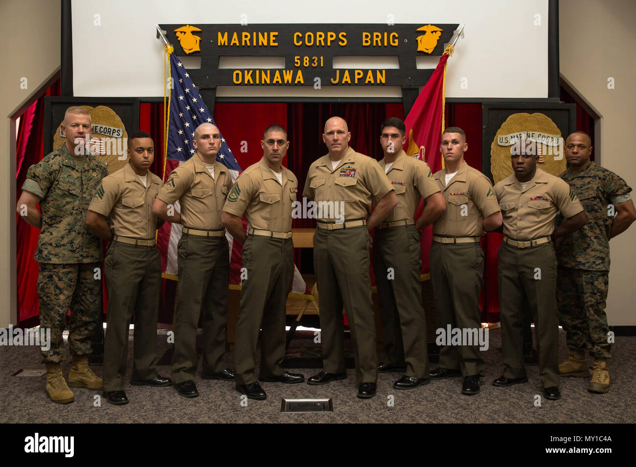 CAMP HANSEN, OKINAWA, Japan- Marines with Marine Corps Installations Pacific Correctional Custody Unit 2.0 poses for a photo at Camp Hansen, Okinawa, Japan. The Correctional Custody Unit 2.0 (CCU) graduation was held to commemorate the return of Marines to their units. Lance Cpl. Cory Watkins returned 3rd Battalion, 3rd Marine Regiment and Pfc. Keanté Anderson returned to Marine Air Control Squadron 4, Marine Tactical Air Command Squadron 18. Stock Photo