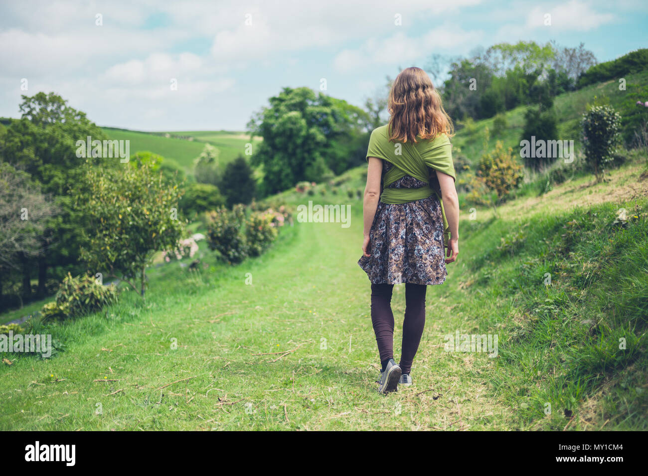 Young woman exploring nature walking hi-res stock photography and ...